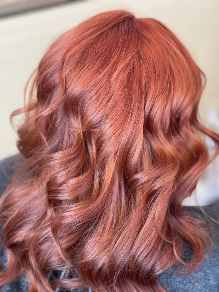 Vibrant copper hair color treatment at F&J Beauty Studio in Anaheim, CA
